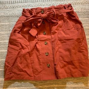 High waisted burnt orange skirt with pockets